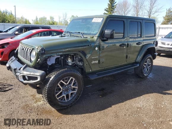 ✅ 2024 Jeep Wrangler Sahara • VIN: 1C4PJXEN9RW117093 • Lot: 56304875. Listed on Copart with 33,741 mi. Free auction sales archive from the USA and detailed vehicle history report at DreamBid. Image 1.