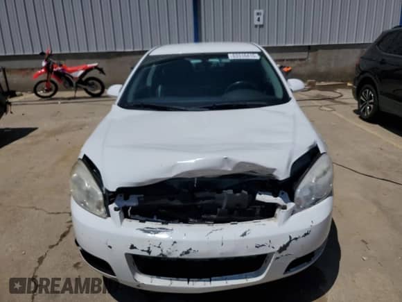 2012 Chevrolet Impala LTZ z VIN 2G1WC5E38C1292774, wystawiony jako Copart lot #63310415 z przebiegiem 153 804 mil mil oraz Szkoda całkowita • Salvage title. Historia ofert i sprzedaży dostępna na DreamBid. Obrazek 5.