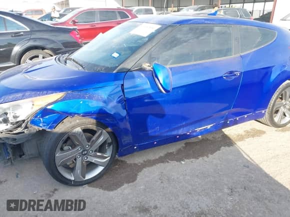 2014 Hyundai Veloster Turbo z VIN KMHTC6AE4EU184467, wystawiony jako IAAI lot #43457856 z przebiegiem 149 546 mil mil oraz . Historia ofert i sprzedaży dostępna na DreamBid. Obrazek 6.