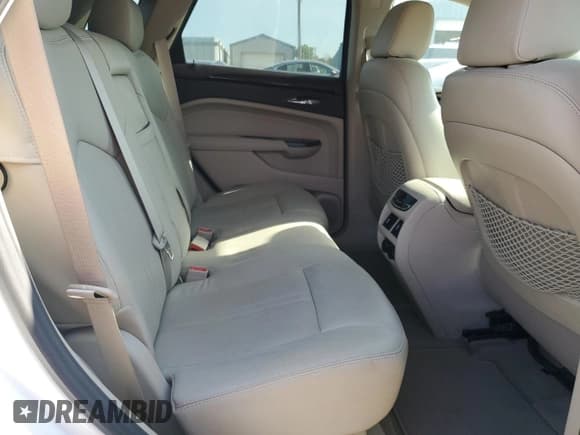 ✅ 2016 Cadillac SRX Premium Collection • VIN: 3GYFNDE32GS548343 • Lot: 63218175. Wystawiony na Copart z przebiegiem 91 265 mil. Bezpłatny archiwum sprzedaży aukcyjnych z USA i szczegółowy raport historii pojazdu na DreamBid. Zdjęcie 10.