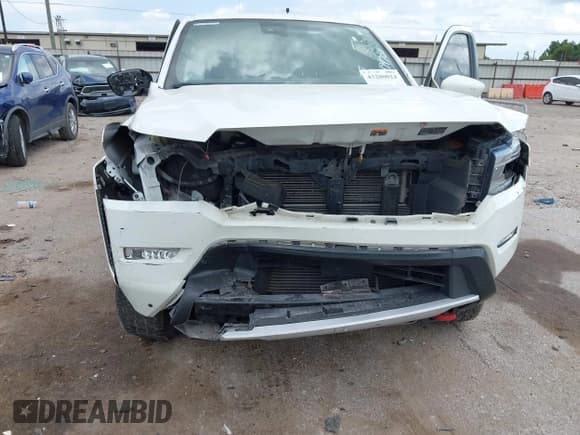 ✅ 2023 Nissan Frontier SV • VIN: 1N6ED1EK4PN629149 • Lot: 43280024. Listed on IAAI with 60,390 mi. Free auction sales archive from the USA and detailed vehicle history report at DreamBid. Image 6.
