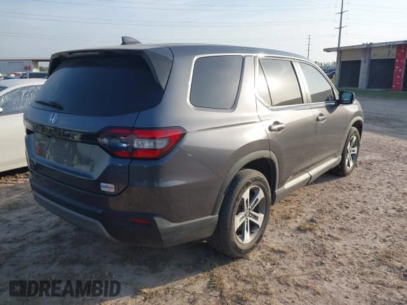 ✅ 2023 Honda Pilot EX-L • VIN: 5FNYG2H42PB013216 • Lot: 41938099. Wystawiony na IAAI z przebiegiem 22 838 mil. Bezpłatny archiwum sprzedaży aukcyjnych z USA i szczegółowy raport historii pojazdu na DreamBid. Zdjęcie 4.