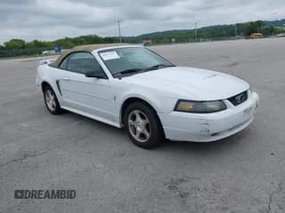 ✅ 2003 Ford Mustang Deluxe • VIN: 1FAFP44443F396063 • Lot: 42877391. Listed on IAAI with 129,173 mi. Free auction sales archive from the USA and detailed vehicle history report at DreamBid. Image 1.