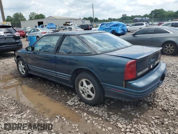 ✅ 1997 Oldsmobile Cutlass Supreme S • VIN: 1G3WH12M1VF330453 • Lot: 64783875. Listed on Copart with 149,213 mi. Free auction sales archive from the USA and detailed vehicle history report at DreamBid. Image 2.