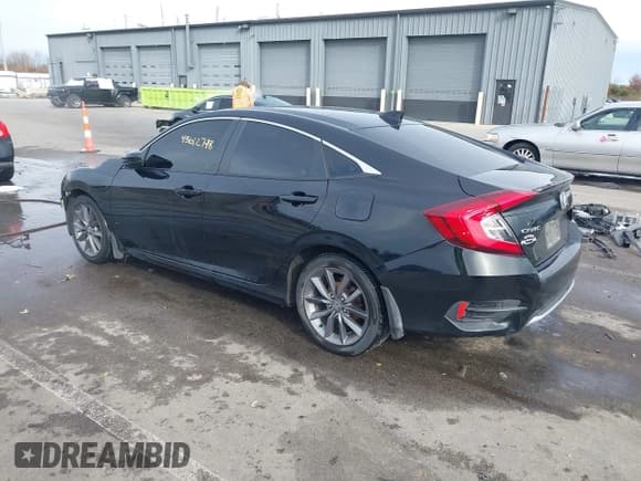 ✅ 2021 Honda Civic EX • VIN: 19XFC1F30ME000604 • Lot: 43612748. Listed on IAAI with 58,774 mi. Free auction sales archive from the USA and detailed vehicle history report at DreamBid. Image 3.