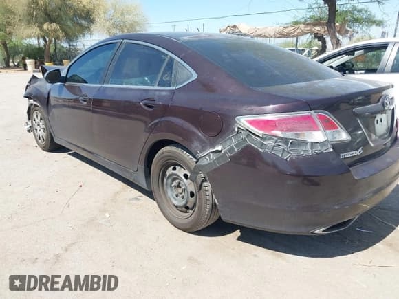 ✅ 2009 Mazda 6 S Grand Touring • VIN: 1YVHP82B695M09612 • Lot: 42537398. Listed on IAAI with 168,931 mi. Free auction sales archive from the USA and detailed vehicle history report at DreamBid. Image 3.