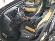 ✅ 2022 BMW X4 M • VIN: 5YM23EC01N9N39875 • Lot: 66325504. Wystawiony na Copart z przebiegiem 35 324 mil. Bezpłatny archiwum sprzedaży aukcyjnych z USA i szczegółowy raport historii pojazdu na DreamBid. Zdjęcie 7.