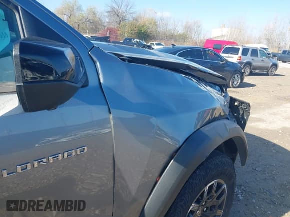 ✅ 2023 Chevrolet Colorado 4WD Trail Boss • VIN: 1GCPTEEK6P1260646 • Лот: 43648543. Опубликован ранее на IAAI с пробегом 48 519 миль. Бесплатный доступ к архиву аукционных продаж из США и подробный отчёт об истории автомобиля на DreamBid. Изображение 19.