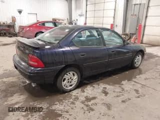 ✅ 1999 Dodge Neon • VIN: 1B3ES47Y1XD124821 • Lot: 41533765. Listed on IAAI with 104,208 mi. Free auction sales archive from the USA and detailed vehicle history report at DreamBid. Image 4.