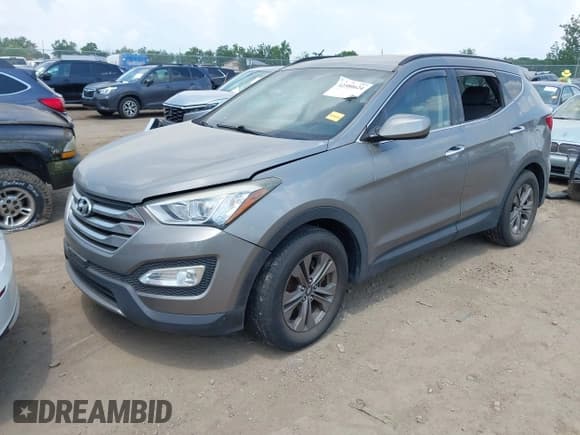 ✅ 2015 Hyundai Santa Fe • VIN: 5XYZUDLB5FG273437 • Лот: 42580624. Опубликован ранее на IAAI с пробегом 92 061 миль. Бесплатный доступ к архиву аукционных продаж из США и подробный отчёт об истории автомобиля на DreamBid. Изображение 17.