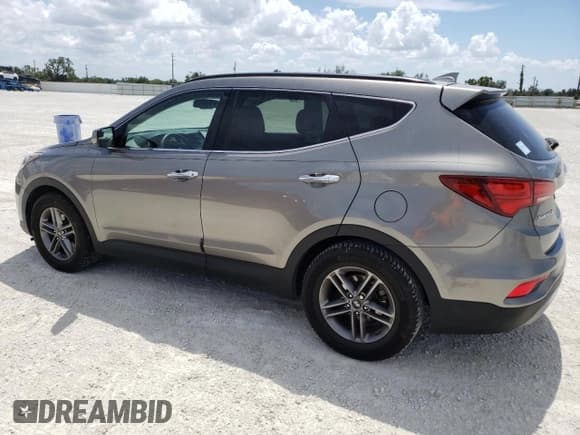 ✅ 2017 Hyundai Santa Fe 2.4L • VIN: 5XYZU3LB4HG381139 • Лот: 46421443. Опубликован ранее на Copart с пробегом 73 306 миль. Бесплатный доступ к архиву аукционных продаж из США и подробный отчёт об истории автомобиля на DreamBid. Изображение 2.