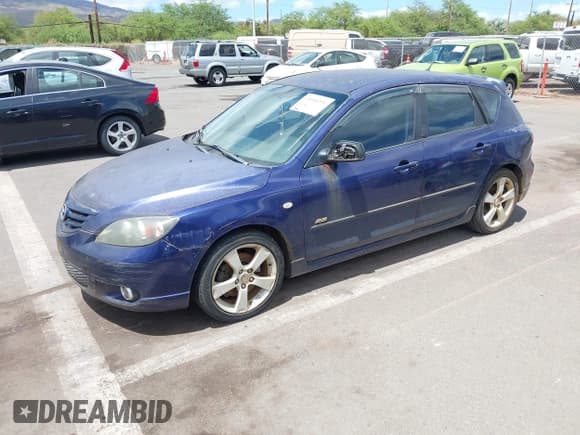 ✅ 2005 Mazda 3 s • VIN: JM1BK143551299404 • Lot: 43296182. Wystawiony na IAAI z przebiegiem Nie podano. Bezpłatny archiwum sprzedaży aukcyjnych z USA i szczegółowy raport historii pojazdu na DreamBid. Zdjęcie 2.