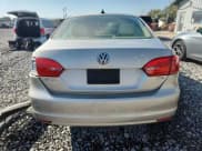 ✅ 2013 Volkswagen Jetta TDI w/Premium/Nav • VIN: 3VWLL7AJ7DM301448 • Lot: 80120565. Listed on Copart with 123,134 mi. Free auction sales archive from the USA and detailed vehicle history report at DreamBid. Image 6.