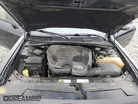 ✅ 2014 Dodge Challenger SXT • VIN: 2C3CDYAG3EH195305 • Lot: 70958424. Wystawiony na Copart z przebiegiem 145 921 mil. Bezpłatny archiwum sprzedaży aukcyjnych z USA i szczegółowy raport historii pojazdu na DreamBid. Zdjęcie 11.