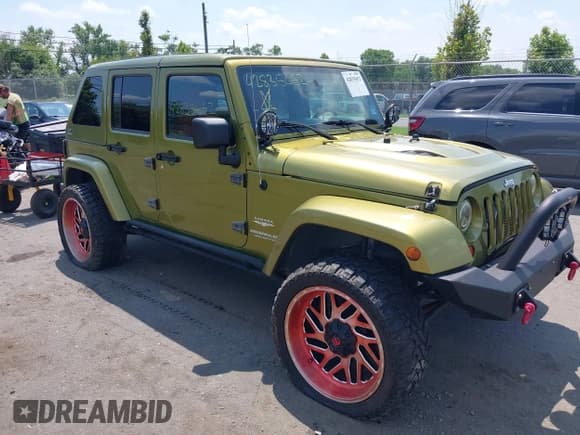 ✅ 2007 Jeep Wrangler Unlimited Sahara • VIN: 1J4GA59117L118162 • Lot: 42835652. Listed on IAAI with 199,208 mi. Free auction sales archive from the USA and detailed vehicle history report at DreamBid. Image 1.