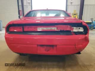 2014 Dodge Challenger SXT z VIN 2C3CDYAG2EH311187, wystawiony jako Copart lot #56570074 z przebiegiem 113 604 mil mil oraz Czysty tytuł • Clean title. Historia ofert i sprzedaży dostępna na DreamBid. Obrazek 6.