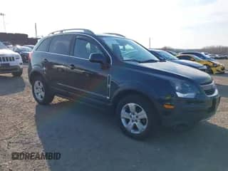 2015 Chevrolet Captiva Sport LS z VIN 3GNAL2EK5FS504411, wystawiony jako IAAI lot #41718728 z przebiegiem 72 474 mil mil oraz . Historia ofert i sprzedaży dostępna na DreamBid. Obrazek 1.