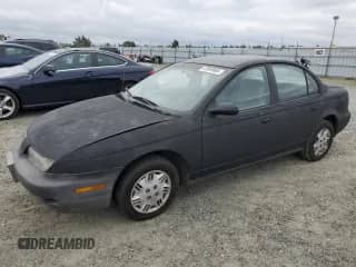 1996 Saturn SL with VIN 1G8ZH5288TZ202529, listed as a Copart auction lot 47859865 with 135,406 mi miles and Salvage title. Bid and sale history available at DreamBid. Image 1.