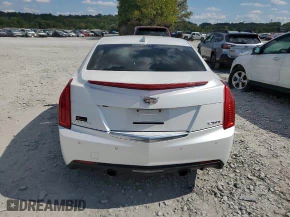 ✅ 2015 Cadillac ATS Luxury AWD • VIN: 1G6AH5RX2F0131520 • Лот: 70846295. Опубликован ранее на Copart с пробегом 153 862 миль. Бесплатный доступ к архиву аукционных продаж из США и подробный отчёт об истории автомобиля на DreamBid. Изображение 6.