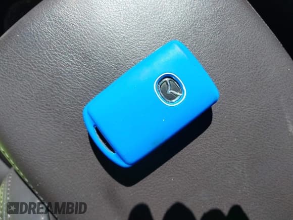 ✅ 2021 Mazda CX-5 Signature • VIN: JM3KFBEY6M0449522 • Lot: 43605201. Listed on IAAI with 15,080 mi. Free auction sales archive from the USA and detailed vehicle history report at DreamBid. Image 11.