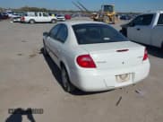 ✅ 2004 Dodge Neon SE • VIN: 1B3ES26C24D583989 • Lot: 43686609. Listed on IAAI with 116,331 mi. Free auction sales archive from the USA and detailed vehicle history report at DreamBid. Image 3.