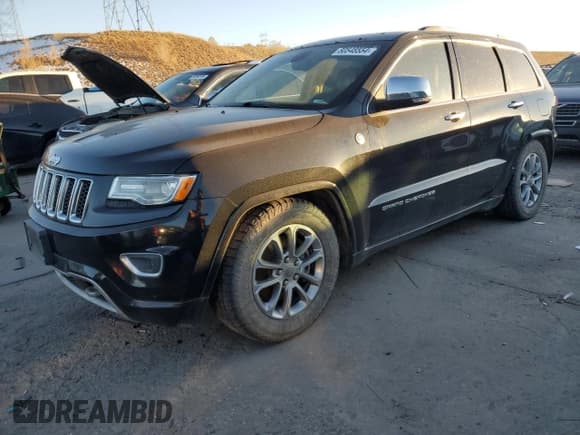 ✅ 2015 Jeep Grand Cherokee Overland • VIN: 1C4RJFCMXFC618455 • Lot: 80548554. Listed on Copart with 175,413 mi. Free auction sales archive from the USA and detailed vehicle history report at DreamBid. Image 1.