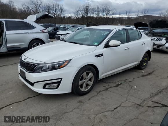 ✅ 2015 Kia Optima LX • VIN: KNAGM4A78F5538671 • Lot: 92164245. Listed on Copart with 123,231 mi. Free auction sales archive from the USA and detailed vehicle history report at DreamBid. Image 1.