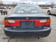 ✅ 1998 Mazda Protege DX • VIN: JM1BC1411W0238344 • Lot: 63596295. Listed on Copart with 74,052 mi. Free auction sales archive from the USA and detailed vehicle history report at DreamBid. Image 6.