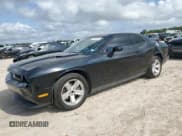 ✅ 2014 Dodge Challenger SXT • VIN: 2C3CDYAG2EH285528 • Lot: 79837834. Wystawiony na Copart z przebiegiem 183 623 mil. Bezpłatny archiwum sprzedaży aukcyjnych z USA i szczegółowy raport historii pojazdu na DreamBid. Zdjęcie 1.