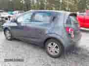 2013 Chevrolet Sonic LT with VIN 1G1JC6SG2D4148084, listed as a IAAI auction lot 43459236 with 94,963 mi miles and . Bid and sale history available at DreamBid. Image 3.