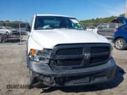 ✅ 2019 Ram 1500 Tradesman • VIN: 1C6RR6FG4KS712451 • Lot: 43528402. Listed on IAAI with 170,630 mi. Free auction sales archive from the USA and detailed vehicle history report at DreamBid. Image 12.