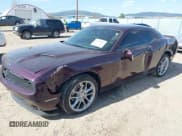 ✅ 2022 Dodge Challenger SXT • VIN: 2C3CDZGG7NH234412 • Lot: 42116869. Listed on IAAI with 61,853 mi. Free auction sales archive from the USA and detailed vehicle history report at DreamBid. Image 2.