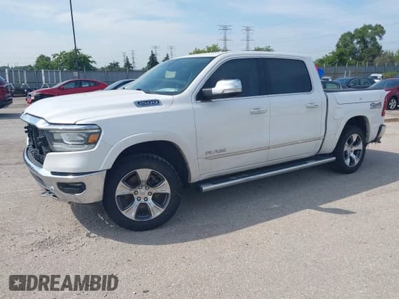 ✅ 2021 Ram 1500 Laramie • VIN: 1C6SRFJT2MN568292 • Lot: 42831621. Listed on IAAI with 81,902 mi. Free auction sales archive from the USA and detailed vehicle history report at DreamBid. Image 17.