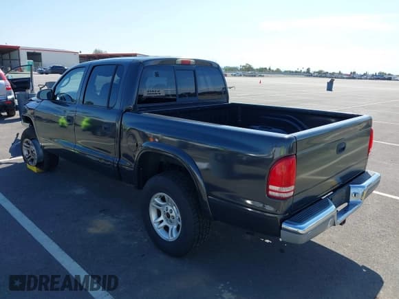 ✅ 2002 Dodge Dakota SLT • VIN: 1B7HG48N82S634864 • Lot: 41839572. Wystawiony na IAAI z przebiegiem 138 557 mil. Bezpłatny archiwum sprzedaży aukcyjnych z USA i szczegółowy raport historii pojazdu na DreamBid. Zdjęcie 3.