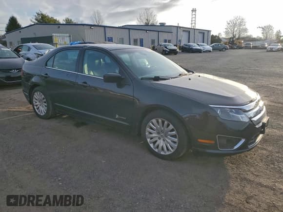 ✅ 2012 Ford Fusion Hybrid • VIN: 3FADP0L39CR309186 • Лот: 93355235. Опубликован ранее на Copart с пробегом 141 374 миль. Бесплатный доступ к архиву аукционных продаж из США и подробный отчёт об истории автомобиля на DreamBid. Изображение 4.