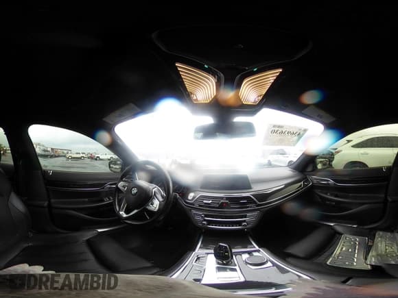 ✅ 2016 BMW 7 Series 740i • VIN: WBA7E2C56GG547033 • Lot: 43693630. Listed on IAAI with 134,884 mi. Free auction sales archive from the USA and detailed vehicle history report at DreamBid. Image 18.