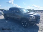 ✅ 2021 Ram 1500 Rebel • VIN: 1C6SRFLT9MN634673 • Lot: 40227246. Listed on IAAI with 39,061 mi. Free auction sales archive from the USA and detailed vehicle history report at DreamBid. Image 1.