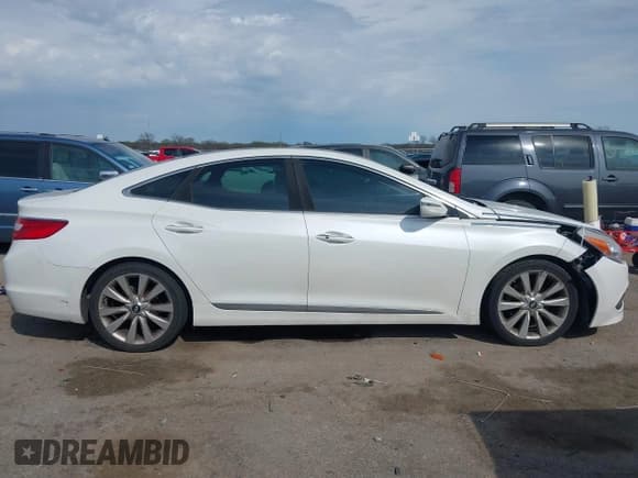 ✅ 2015 Hyundai Azera Limited • VIN: KMHFH4JG7FA476458 • Lot: 41893979. Wystawiony na IAAI z przebiegiem 149 114 mil. Bezpłatny archiwum sprzedaży aukcyjnych z USA i szczegółowy raport historii pojazdu na DreamBid. Zdjęcie 13.
