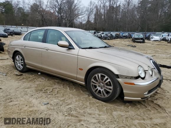 ✅ 2003 Jaguar S-Type • VIN: SAJEA01U33HM71782 • Lot: 82969304. Listed on Copart with 127,176 mi. Free auction sales archive from the USA and detailed vehicle history report at DreamBid. Image 4.