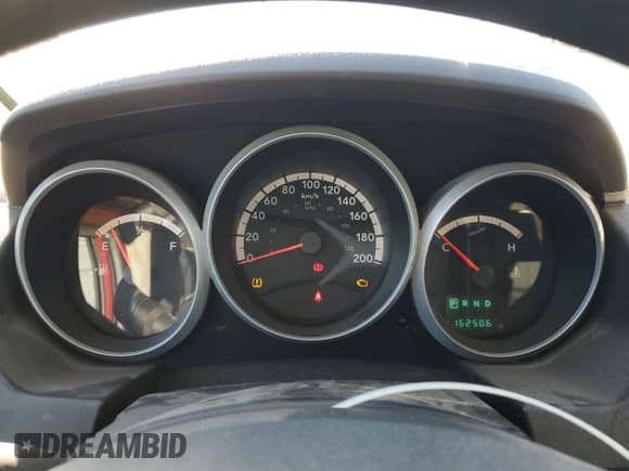 2009 Dodge Grand Caravan SE with VIN 2D8HN44E79R537938, listed as a Copart auction lot 90581805 with 162,506 mi miles and Salvage title. Bid and sale history available at DreamBid. Image 9.