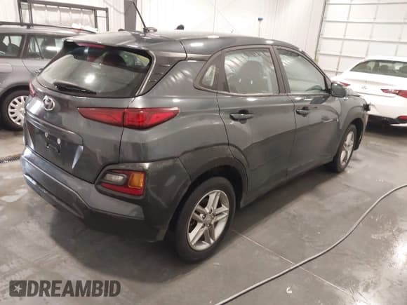 ✅ 2021 Hyundai Kona SE • VIN: KM8K12AA3MU642246 • Лот: 41459938. Опубликован ранее на IAAI с пробегом 87 123 миль. Бесплатный доступ к архиву аукционных продаж из США и подробный отчёт об истории автомобиля на DreamBid. Изображение 4.