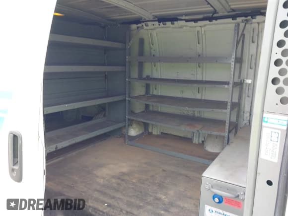 ✅ 2012 Chevrolet Express Cargo • VIN: 1GCWGFCA5C1168566 • Lot: 42873898. Listed on IAAI with 206,811 mi. Free auction sales archive from the USA and detailed vehicle history report at DreamBid. Image 8.