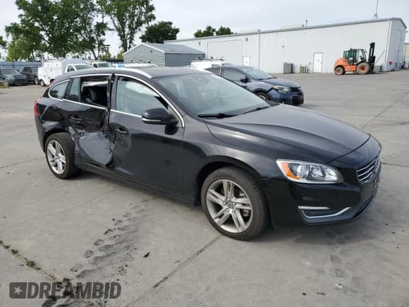 ✅ 2015 Volvo V60 T5 Drive-E Premier • VIN: YV140MEK4F1261924 • Лот: 53111885. Опубликован ранее на Copart с пробегом 86 620 миль. Бесплатный доступ к архиву аукционных продаж из США и подробный отчёт об истории автомобиля на DreamBid. Изображение 4.