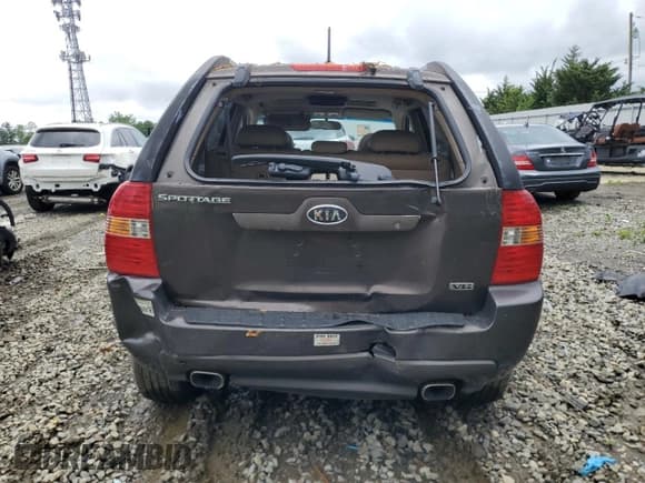 ✅ 2006 Kia Sportage LX • VIN: KNDJE723X67233079 • Lot: 56394225. Listed on Copart with 202,237 mi. Free auction sales archive from the USA and detailed vehicle history report at DreamBid. Image 6.