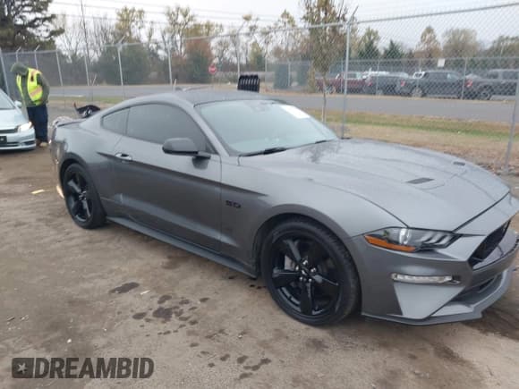 ✅ 2021 Ford Mustang GT Premium • VIN: 1FA6P8CF9M5101041 • Lot: 43562355. Listed on IAAI with 36,717 mi. Free auction sales archive from the USA and detailed vehicle history report at DreamBid. Image 1.