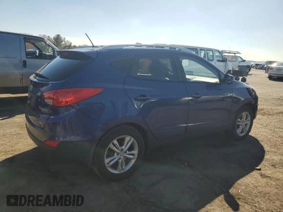 2011 Hyundai Tucson Limited with VIN KM8JUCAC3BU244297, listed as a Copart auction lot 48629585 with 208,270 mi miles and Salvage title. Bid and sale history available at DreamBid. Image 3.