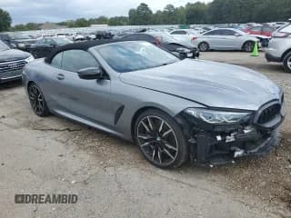 ✅ 2023 BMW 8 Series M850i xDrive • VIN: WBAFY4C00PCM83100 • Лот: 87192315. Опубликован ранее на Copart с пробегом 10 048 миль. Бесплатный доступ к архиву аукционных продаж из США и подробный отчёт об истории автомобиля на DreamBid. Изображение 4.