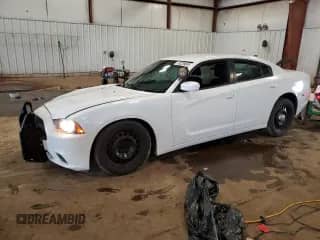 2014 Dodge Charger Police with VIN 2C3CDXKT6EH280127, listed as a Copart auction lot 82289045 with 76,673 mi miles and Clean title. Bid and sale history available at DreamBid. Image 1.