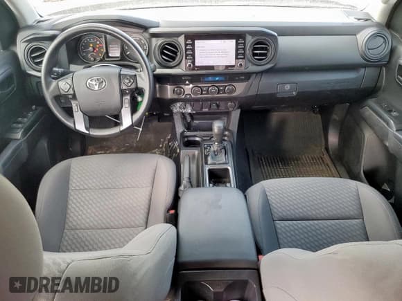 ✅ 2023 Toyota Tacoma SR • VIN: 3TYCZ5AN4PT153874 • Лот: 92057885. Опубликован ранее на Copart с пробегом 17 831 миль. Бесплатный доступ к архиву аукционных продаж из США и подробный отчёт об истории автомобиля на DreamBid. Изображение 8.