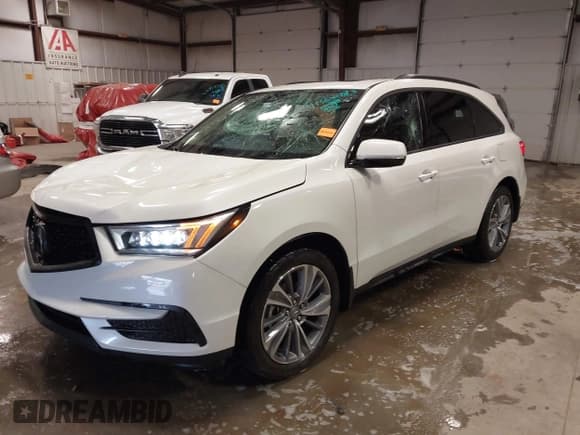 ✅ 2018 Acura MDX Technology • VIN: 5J8YD4H70JL009041 • Лот: 41306933. Опубликован ранее на IAAI с пробегом 78 962 миль. Бесплатный доступ к архиву аукционных продаж из США и подробный отчёт об истории автомобиля на DreamBid. Изображение 18.
